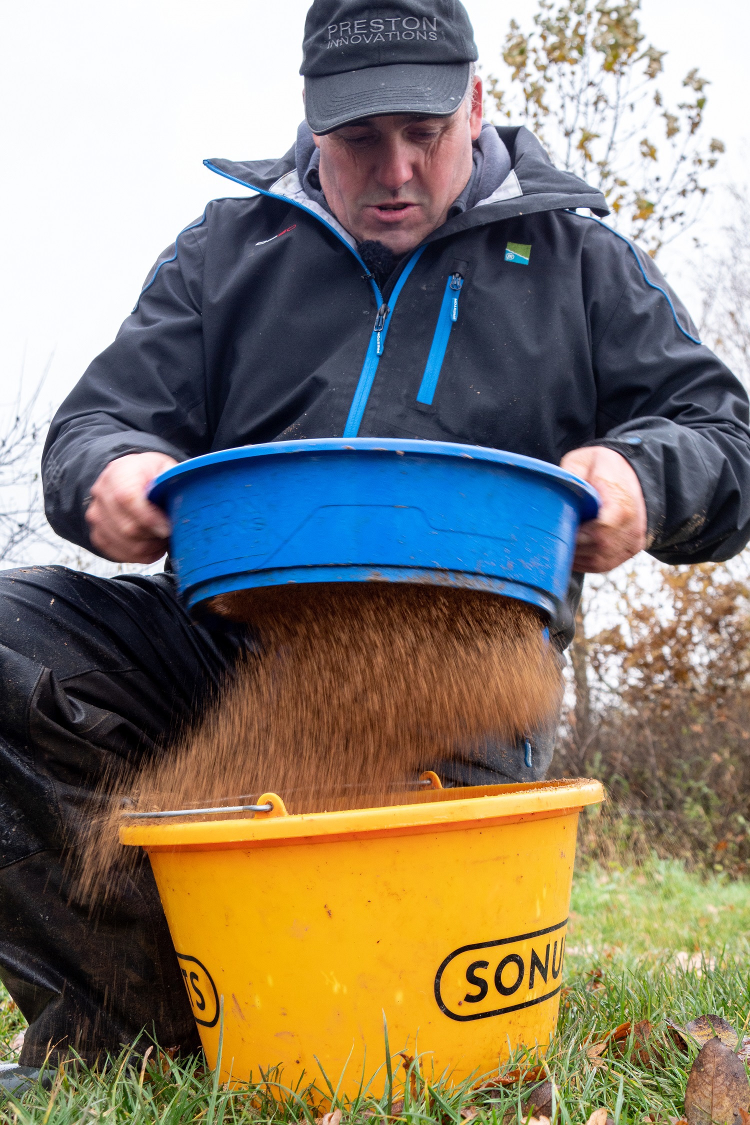 Des fixing his bait mix