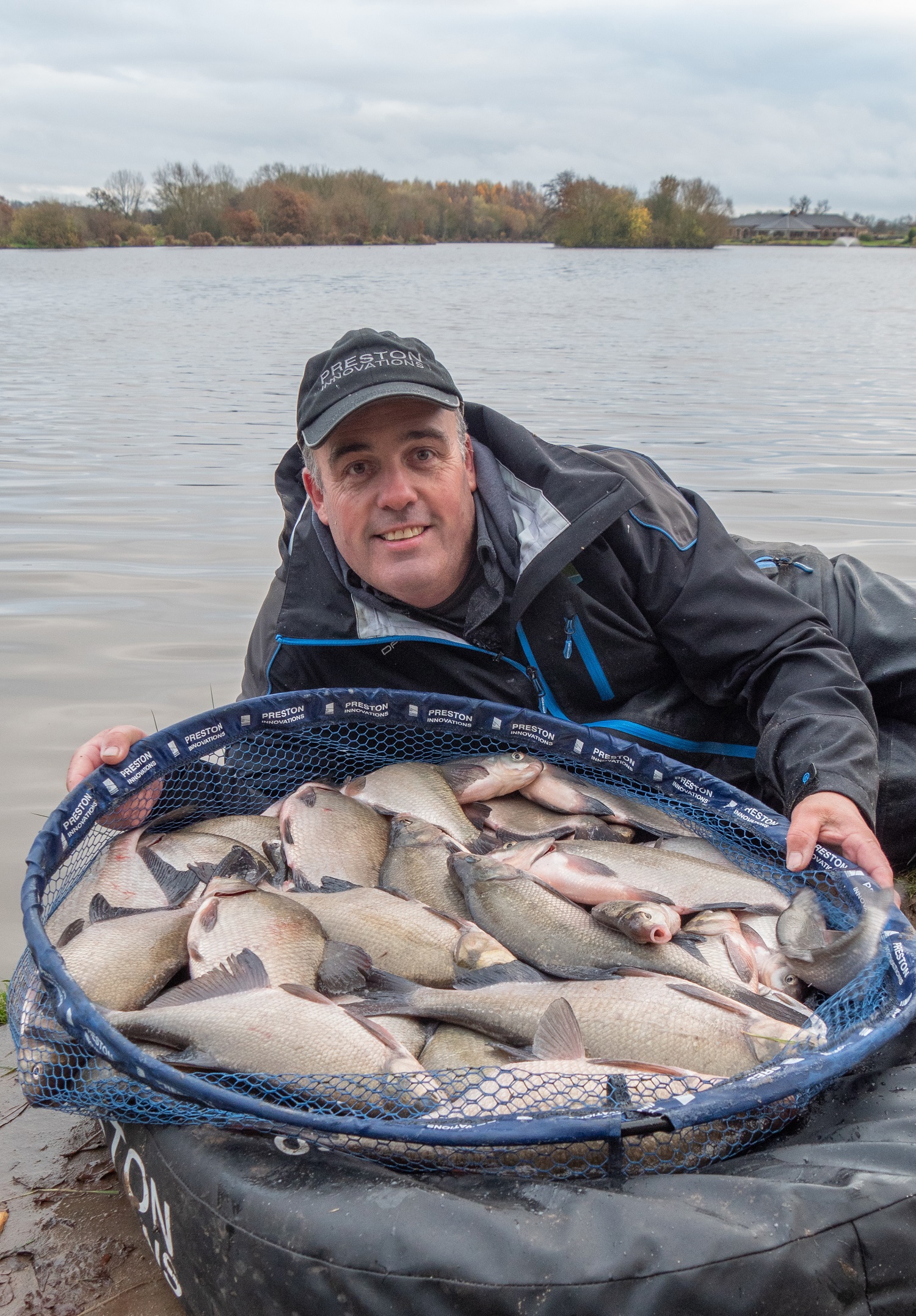Des with a heavy load of fish he caught after his session